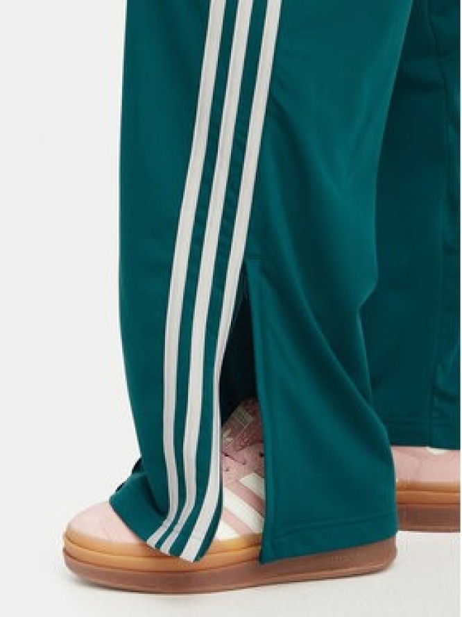 adidas Spodnie dresowe Firebird Loose Tracksuit KS4672 Turkusowy Loose Fit