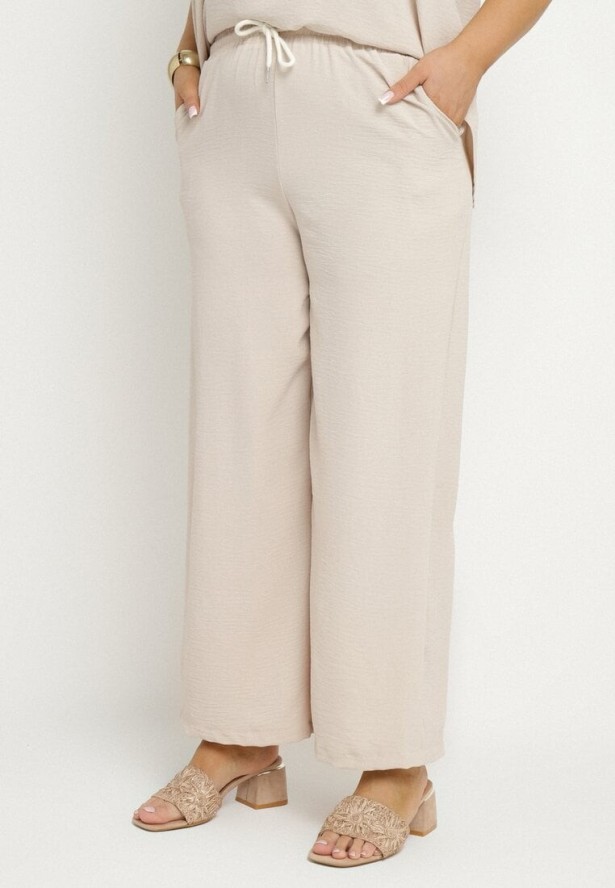 Jasnobeżowy Komplet o Fasonie Oversize Bluzka i Szerokie Spodnie Amisora