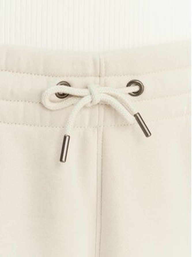 Under Armour Spodnie dresowe UA Icon Fleece 6001537 Beżowy Slim Fit