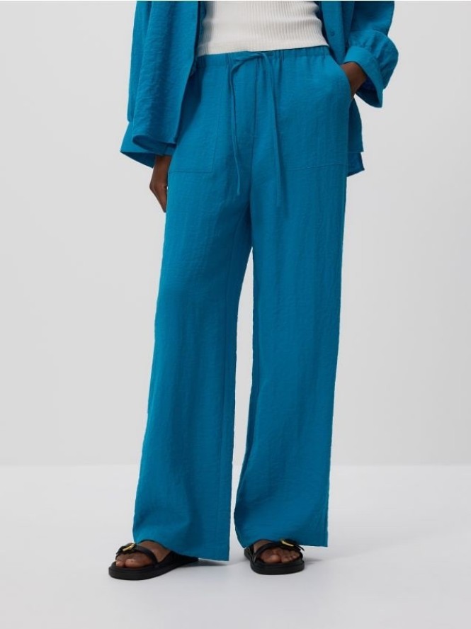 Luźne spodnie z wiskozą - turkusowy