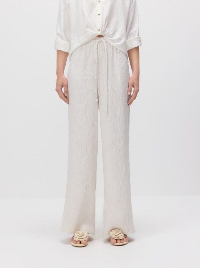 Luźne spodnie z wiązaniem - złamana biel