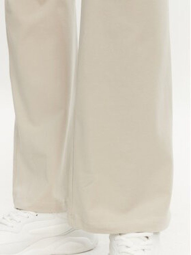 adidas Legginsy Essentials Small Logo JD3072 Beżowy Flare Fit