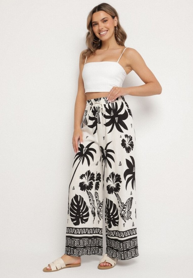 Czarno-Beżowe Spodnie z Tropikalnym Wzorem i Szerokimi Nogawkami Emivelli