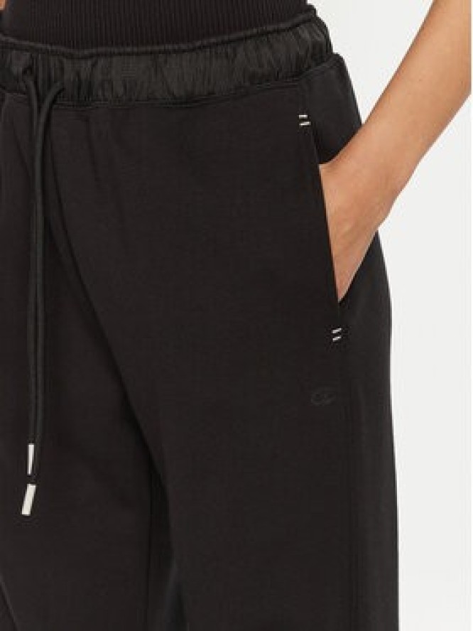 Champion Spodnie dresowe 117477 Czarny Slim Fit