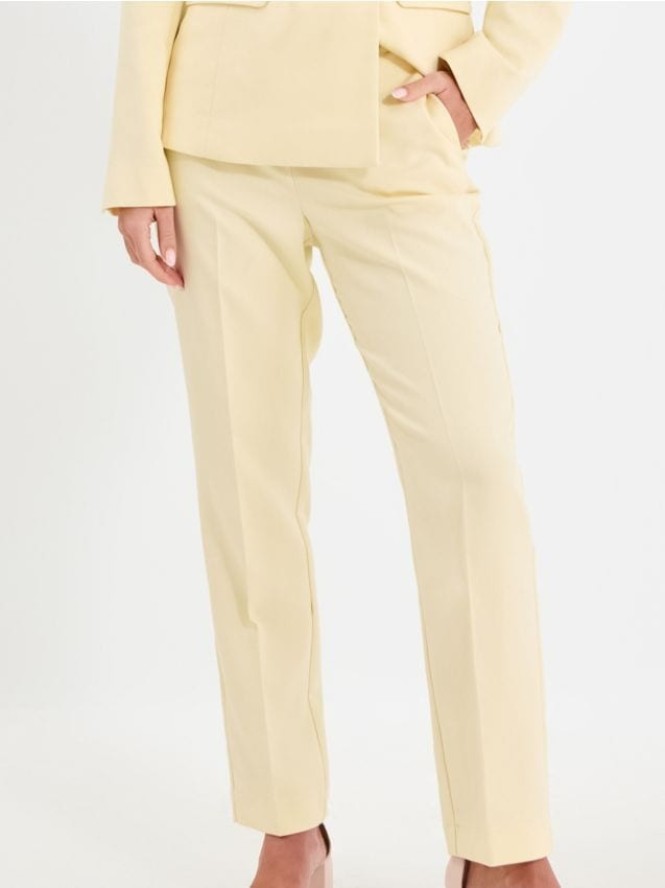Spodnie w kant - żółty
