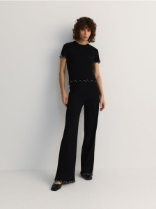 Dzianinowe spodnie z ozdobnym wykończeniem - czarny