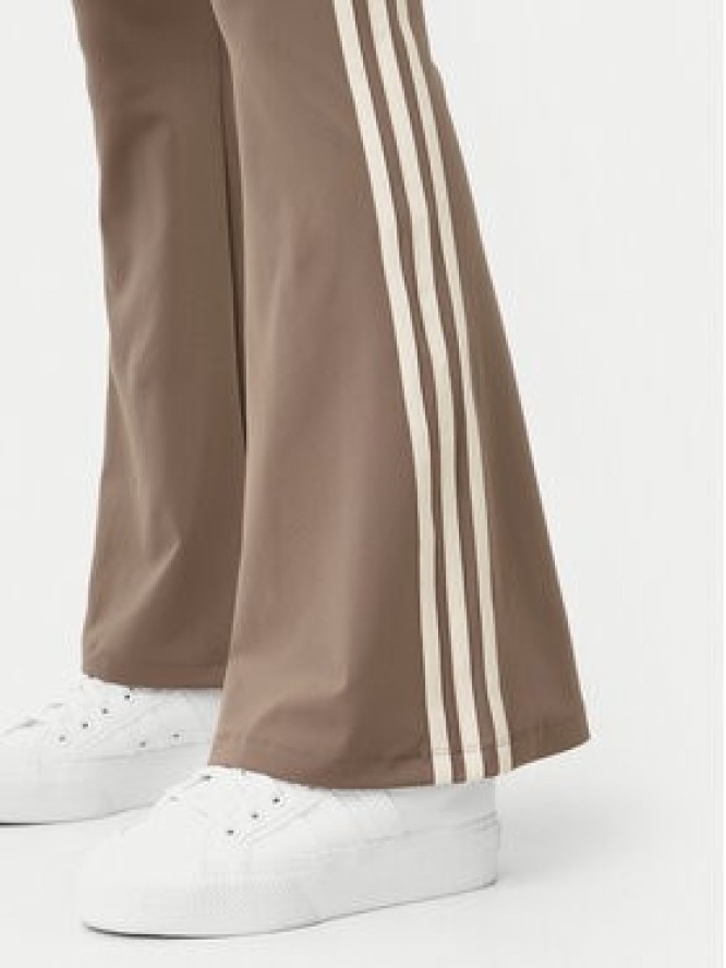 adidas Legginsy JD4601 Beżowy Flare Fit