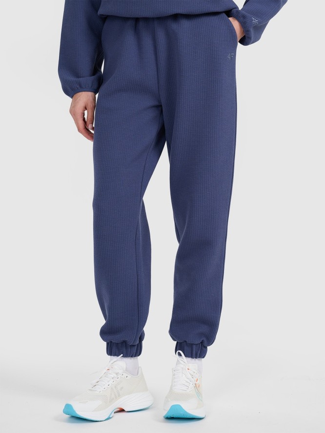 4F Spodnie dresowe z waflowej dzianiny damskie - granatowe XL