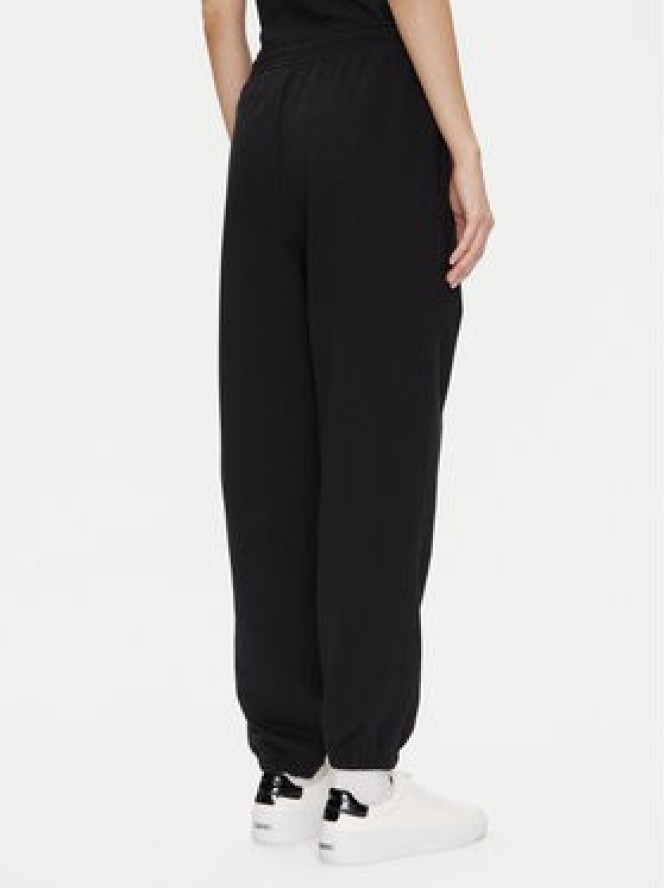 Calvin Klein Jeans Spodnie dresowe Monologo LV047B235G Czarny Regular Fit