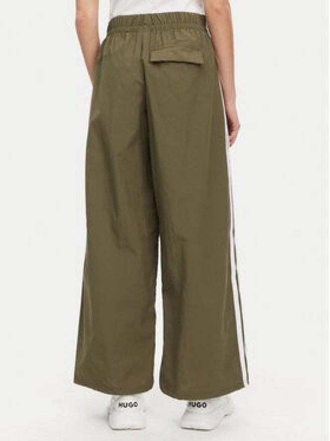 adidas Spodnie dresowe Essentials 3-Stripes JE1308 Zielony Loose Fit