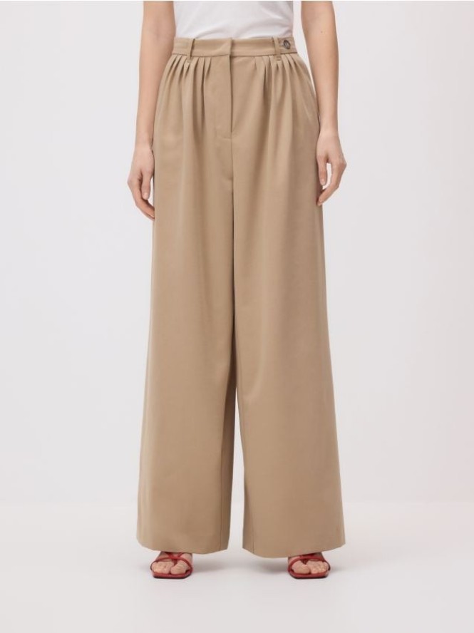 Spodnie wide leg - beżowy