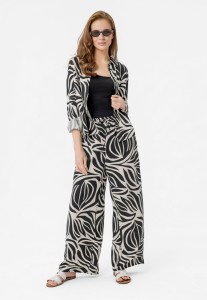 Luźne spodnie z wzorem R-DOLANA