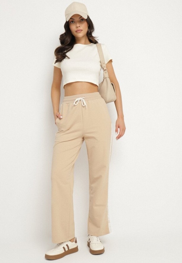 Beżowe Spodnie Dresowe z Bawełną i Wysokim Stanem Ozdobione Koronką Evarose