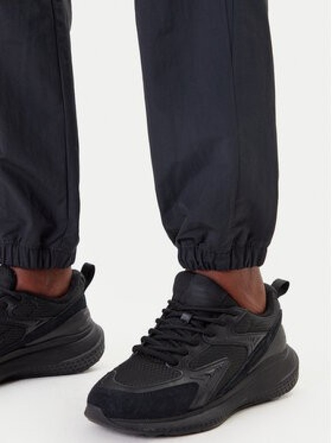 Reebok Spodnie dresowe Vector 100221435 Czarny Relaxed Fit