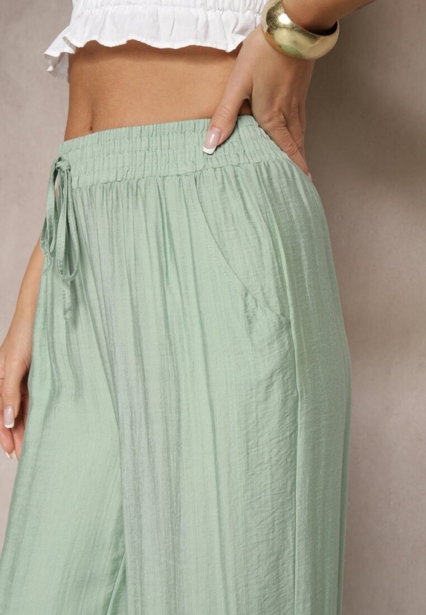 Miętowe Spodnie Typu Palazzo o Szerokim Kroju High Waist Ozdobione Wiązaniem Yaslevia