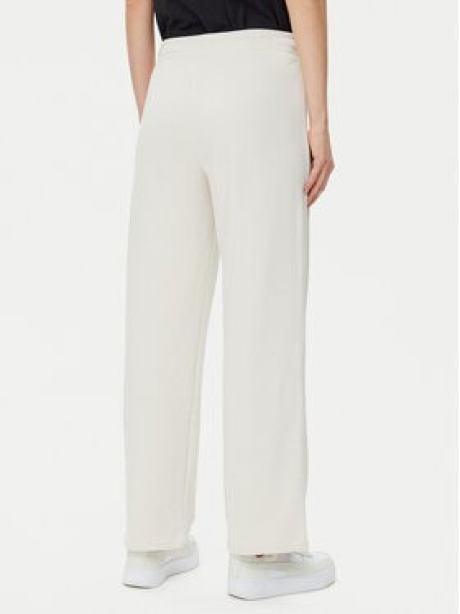 Puma Spodnie dresowe Ess Small No. 1 Logo 684979 Beżowy Straight Fit