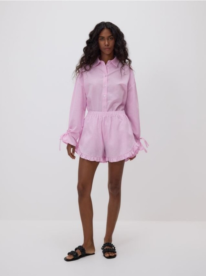 Bawełniane szorty z falbankami - różowy