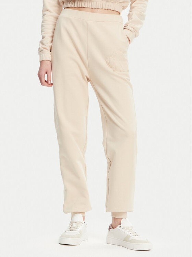 Calvin Klein Jeans Spodnie dresowe J20J225355 Beżowy Regular Fit