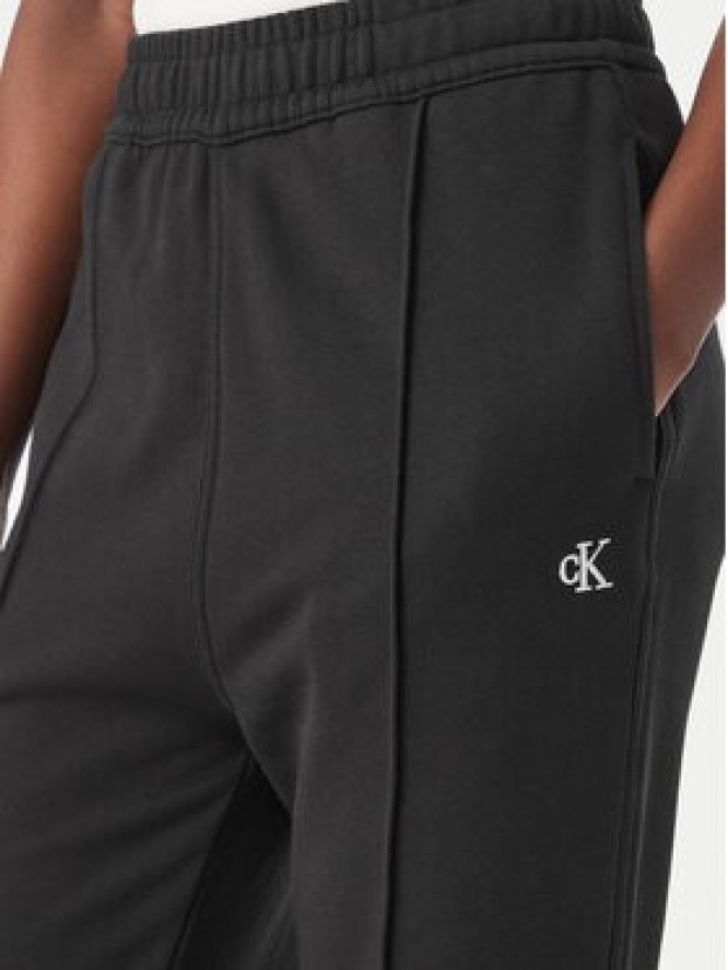 Calvin Klein Jeans Spodnie dresowe Monogram LV047H220G Czarny Flare Fit