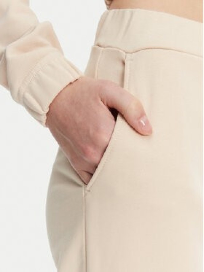 Calvin Klein Jeans Spodnie dresowe J20J225355 Beżowy Regular Fit