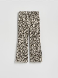 Jeansy w zwierzęcy wzór - wielobarwny