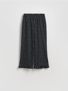 Spodnie w groszki z falbanką - czarny