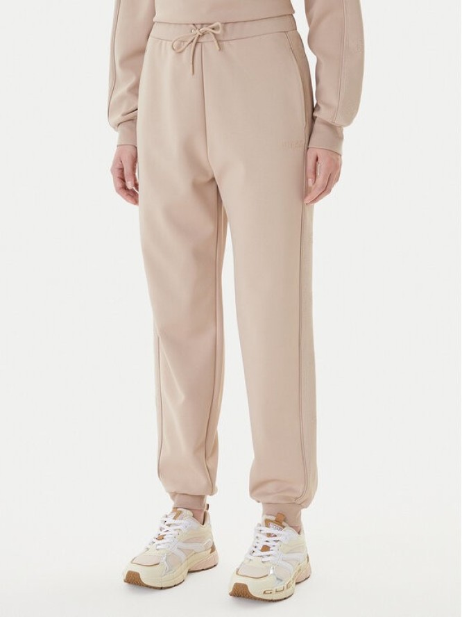 Guess Spodnie dresowe V5BB23 KCX22 Beżowy Regular Fit