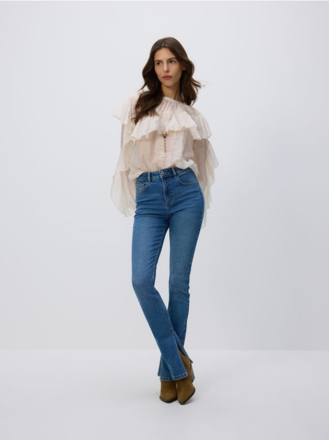 Jeansy slim fit z rozcięciem - niebieski