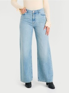 Jeansy wide leg z efektem sprania - turkusowy