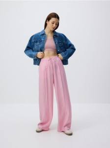 Spodnie z tkaniną cupro - pastelowy róż