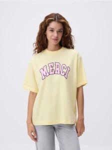 T-shirt oversize z nadrukiem - jasnożółty