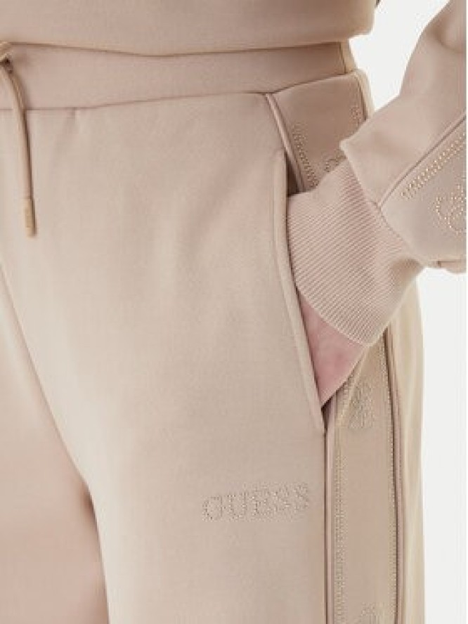 Guess Spodnie dresowe V5BB12 KCX22 Beżowy Regular Fit