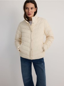 Pikowana kurtka - kremowy