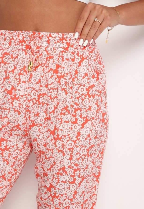 Pomarańczowe Kwiatowe Spodnie z Wiskozy Wykończone Gumką w Talii Rivattha