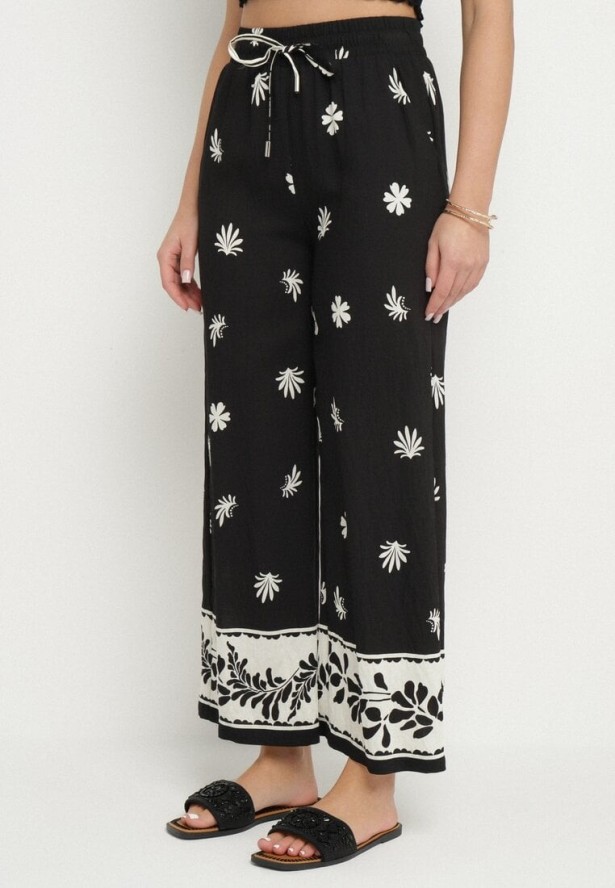 Czarne Szerokie Spodnie z Wiskozy w Kwiatowy Wzór z Gumką w Pasie Nimiova