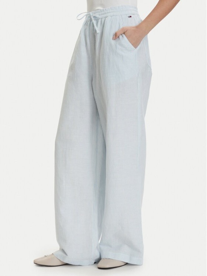 Tommy Jeans Spodnie materiałowe DW0DW22285 Niebieski jasny Loose Fit