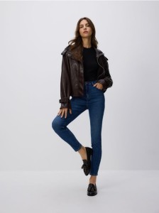 Jeansy slim fit z przetarciami - granatowy