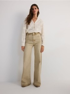 Jeansy flare z wysokim stanem - beżowy