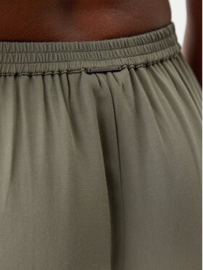 Calvin Klein Swimwear Spodnie materiałowe KW0KW02823 Zielony Relaxed Fit