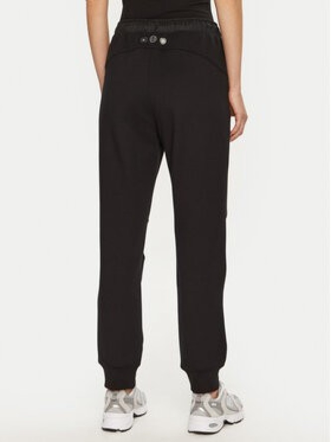 Champion Spodnie dresowe 117477 Czarny Slim Fit