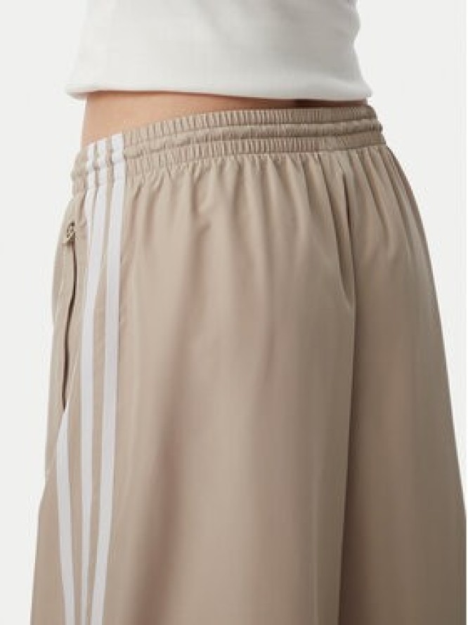 adidas Spodnie dresowe Firebrid Adilenium Track KT0019 Beżowy Relaxed Fit