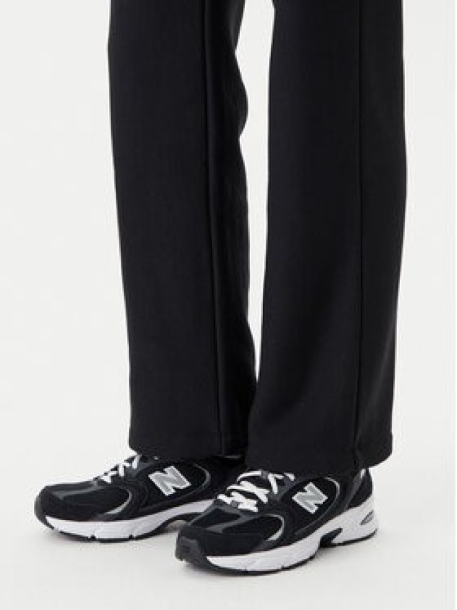 Champion Spodnie dresowe 117983 Czarny Slim Fit