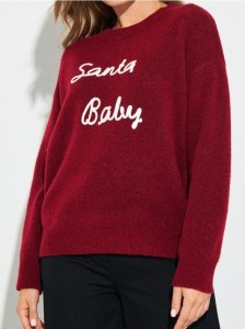 Świąteczny sweter z napisem "Santa Baby" z domieszką wełny - różowy